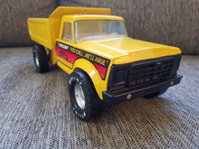 Load image into Gallery viewer, Vintage Nylint Dumper Toy Steel “You Call We’ll Haul" USA Yellow Dump Truck