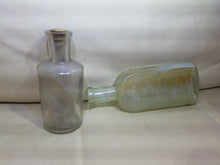 Load image into Gallery viewer, Antique Lettered Bottles- Stove Paint, Ed Pinaud Paris, Cough Med, Shoe Shine, etc.