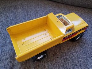 Vintage Nylint Dumper Toy Steel “You Call We’ll Haul" USA Yellow Dump Truck